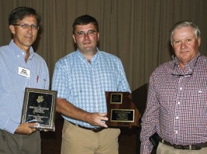 Eddie Miller Jr., Seminole County farmer who had top overall yield in state for 300 or more acres is shown at right. Also shown from left, are Seminole County ANR agent Rome Ethredge and UGA peanut agronomist Scott Monfort.