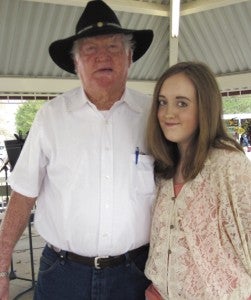 Smithville Mayor Jack Smith and local talent Amber Cremeans at the Chicken Pie Festival Saturday. 