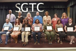 From left, seated, are SGTC Student of Excellence nominees Nathan Tanner, Nickie McMillan, Ryshanna Brown, Corcynthia Monts, Kristina Harp, Kanisha Ellis, and Shelby Smith. Standing, from left, are nominating instructors Walter Dennard, Dorothea Lusane-McKenzie, Teresa McCook, Ricky Watzlowick, Angeli Smith, Diana Skipper, and Jennifer Childs.