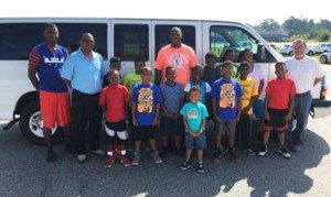 Submitted by Dwight Harris, Sr.:   Members of the DHBC stand in front of the van that was recently donated to the club by Langdale Automotive, of Americus.