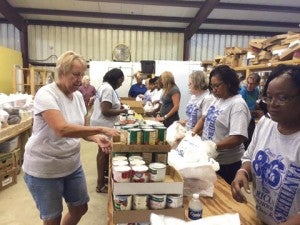The women of the Class of ‘86 enjoyed the fellowship of their volunteer service at Harvest of Hope Food Pantry.