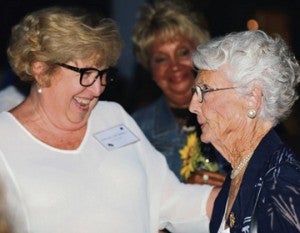 Jean Dalton Daniel, at left, shares a laugh with Betty Bailey Todd, wife of Ed N. Bailey, the first headmaster of Smithville Academy.