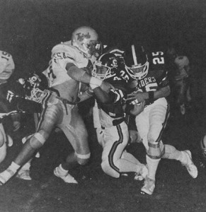 From the 1987 Southland Academy Yearbook: Southland’s Chan Reeves (25) rushes past a defender as Paul Kim (42) blocks during an early-season contest during the Raiders’ 1986 season.