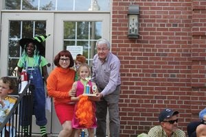 Michael Murray/Americus Times-Recorder: There must have been a mystery downtown, because the Scooby Doo crew (The Williams Family, which received a second-place award in the costume/pet category) was definitely on the case!