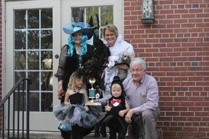 Michael Murray/Americus Times-Recorder: This family of spiders (Bess and Carolyn Hartley and Grace and Matthew Williams) took first-place honors with their pets’ costumes showing a clever mixture of spooky and adorable