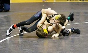 MICHAEL MURRAY I ATR:   In this photo from the Feb. 10 edition of the Times-Recorder, Southland Academy’s Cole Landreth grapples with an opponent at the state wrestling meet held at the GSW Storm Dome in Americus. Landreth went on to win the state title in the 106-pound division at the tournament.