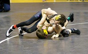 MICHAEL MURRAY I ATR: In this photo from the Feb. 10 edition of the Times-Recorder, Southland Academy’s Cole Landreth grapples with an opponent at the state wrestling meet held at the GSW Storm Dome in Americus. Landreth went on to win the state title in the 106-pound division at the tournament.