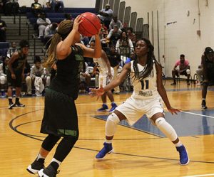 MICHAEL MURRAY I ATR: ASHS’ De’Asia Ford prepares to go in for a steal during the Lady Panthers’ Dec. 21 tilt against the Monroe Lady Tornadoes at the Panther Den in Americus.