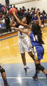 MICHAEL MURRAY I ATR:   ASHS’ Tykiera Long takes a jumper from the key during the Lady Panthers’ Dec. 9 tilt against Crisp County in Americus. Long contributed eight points to the ASHS victory.