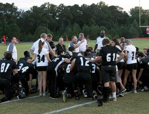 MICHAEL MURRAY I ATR: Schley County head football coach, Darren Alford (center), addresses his team in this photo from the Oct. 26, 2016 edition of the Times-Recorder.