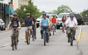 MICHAEL MURRAY I ATR: In this photo, from the May 28, 2016 edition of the Times-Recorder, Americus mayor, Barry Blount (center) is seen taking a bike ride with members of Sumter Cycling and other local residents after declaring Americus a “complete streets” town.
