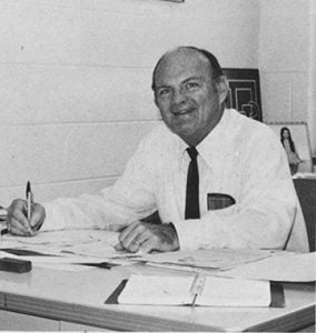 Dean Harold Moore is shown above at his desk at South Georgia Technical College.