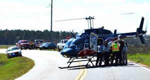 One of the accident victims was ejected from the vehicle, and was airlifted to a Macon hospital Friday.